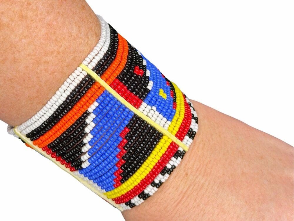 Anthropologie beaded cuff with snap closure